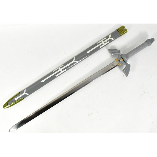 608 - Zelda -  a replica / cosplay Legends of Zelda Twilight Master Sword Hyrule Triforce Replica White Ze... 