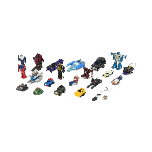 556 - Transformers - a collection of original vintage c1980s G1 Hasbro Transformers action figures / toys.... 