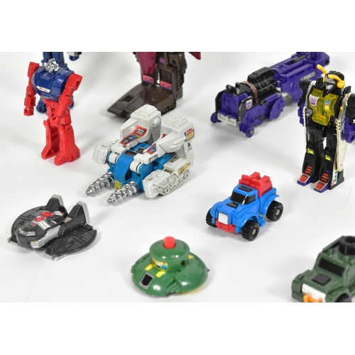 556 - Transformers - a collection of original vintage c1980s G1 Hasbro Transformers action figures / toys.... 