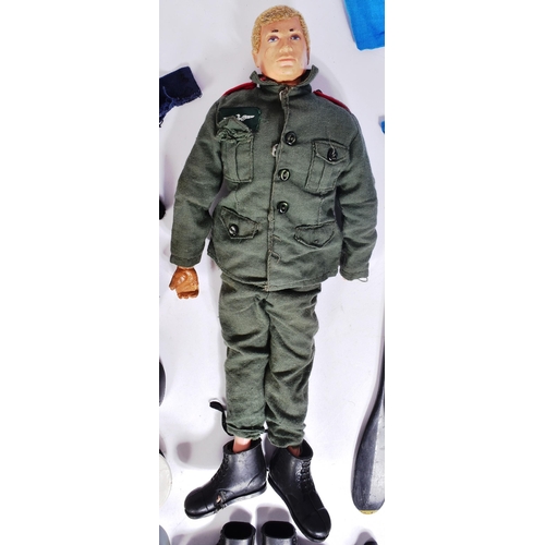 557 - Action Man - an original vintage Palitoy Action Man figure with a selection of clothing and accessor... 