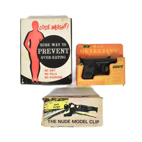 579 - An original vintage Lone Star Spudmatic gun along with x2 novelty toys comprising a nude model clip ... 