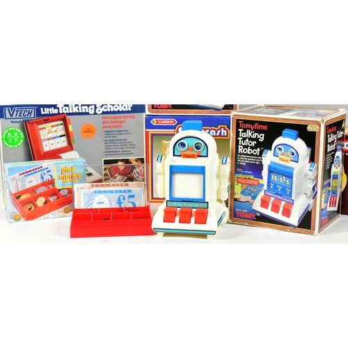 602 - A collection of x6 vintage 1980s childrens playsets comprising a Vtech Little Talking Scholar, Tomy ... 