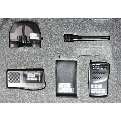 616 - Mission Impossible - a Mission Impossible secret agent spy kit containing a Mini Radio, Olympus Micr... 