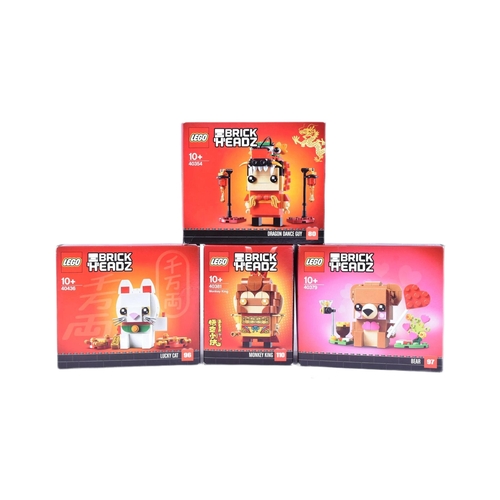 476 - Lego - a collection of x4 assorted Lego Brickheadz sets comprising; 40354 Dragon Dance Guy, 40381 Mo... 