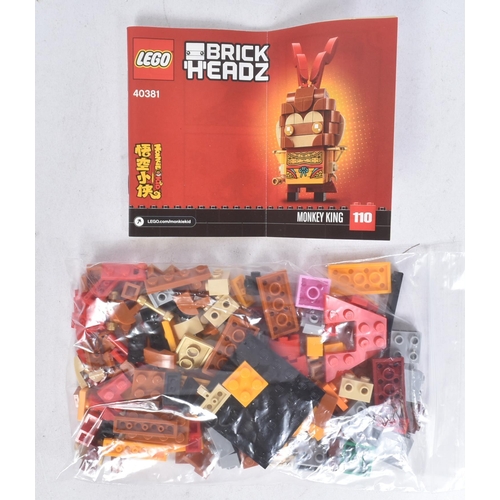 476 - Lego - a collection of x4 assorted Lego Brickheadz sets comprising; 40354 Dragon Dance Guy, 40381 Mo... 