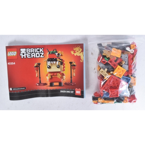 476 - Lego - a collection of x4 assorted Lego Brickheadz sets comprising; 40354 Dragon Dance Guy, 40381 Mo... 