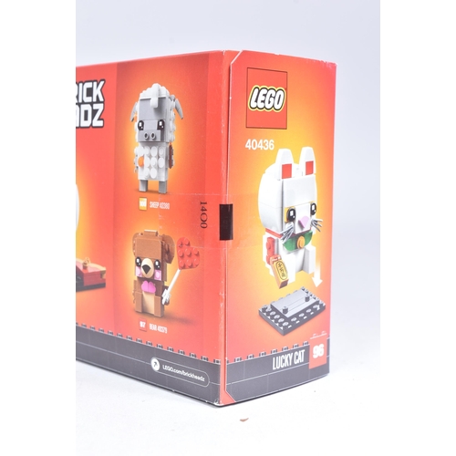 476 - Lego - a collection of x4 assorted Lego Brickheadz sets comprising; 40354 Dragon Dance Guy, 40381 Mo... 