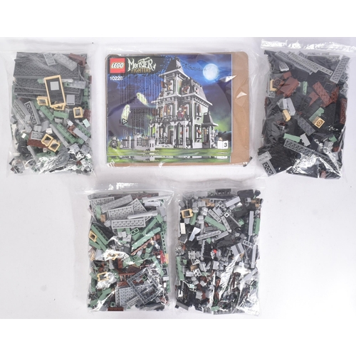 498 - Lego - an original Lego Monster Fighters set No. 10228 The Haunted House. The set rebagged, with all... 