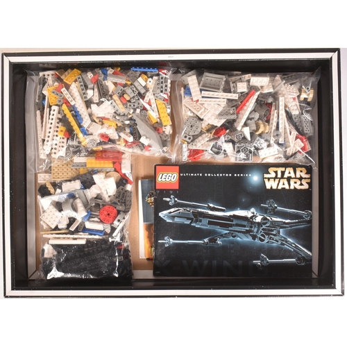 524 - Lego - an original Lego Star Wars UCS Ultimate Collector Series set No. 7191 X-Wing Fighter. The set... 