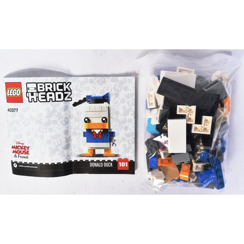 534 - Lego - x2 original Lego Brickheadz sets comprising; 40377 Donald Duck and 40378 Pluto & Goofy. The s... 