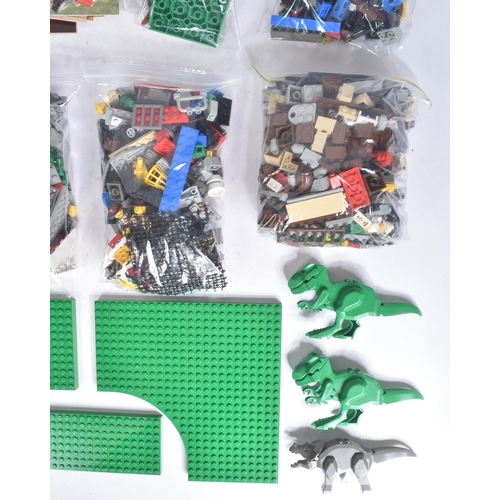 587 - Lego - a collection of Lego Adventure theme sets comprising; 5987 Dino Research Compound, 5911 Johnn... 