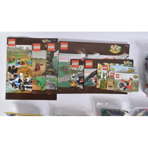 587 - Lego - a collection of Lego Adventure theme sets comprising; 5987 Dino Research Compound, 5911 Johnn... 