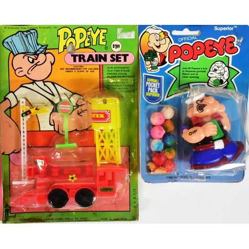 759 - Popeye - a collection of x8 vintage 1980s carded / rack pack toys of Popeye interest to include; bub... 