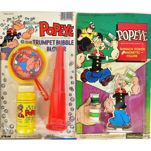 759 - Popeye - a collection of x8 vintage 1980s carded / rack pack toys of Popeye interest to include; bub... 