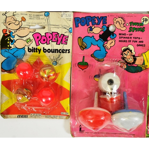 759 - Popeye - a collection of x8 vintage 1980s carded / rack pack toys of Popeye interest to include; bub... 