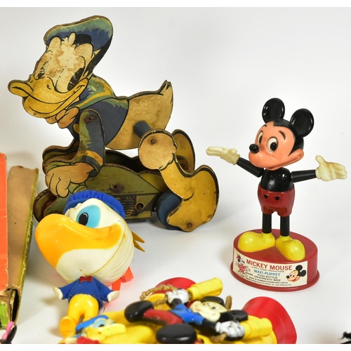 787 - Walt Disney - a collection of vintage Disney toys comprising a Mickey Mouse Drawing Tutorial pantogr... 