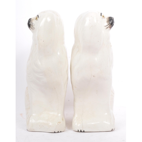 104 - A pair of  large 19th century Victorian King Charles Staffordshire ceramic spaniels dogs. The pair o... 