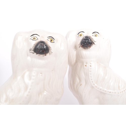 104 - A pair of  large 19th century Victorian King Charles Staffordshire ceramic spaniels dogs. The pair o... 