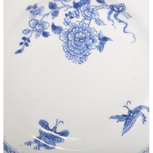 11 - Two 19th century Qing dynasty Chinese blue and white plates. One featuring a garden scene, with a de... 