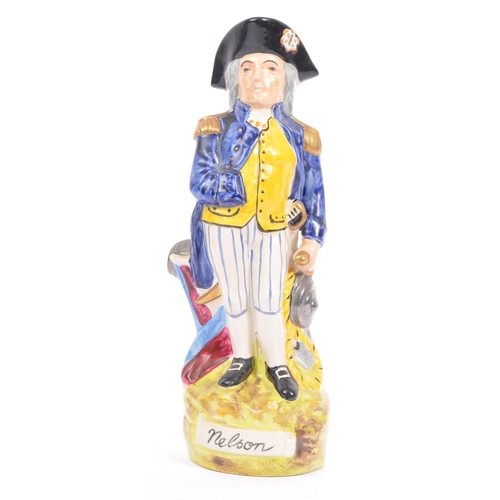 119 - Staffordshire Pottery - An early 20th century 'Horatio Nelson' commemorative character spill vase / ... 