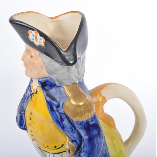 119 - Staffordshire Pottery - An early 20th century 'Horatio Nelson' commemorative character spill vase / ... 