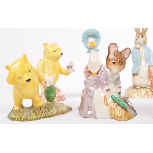 131 - A collection of Royal Albert Beatrix Potter collection and Royal Doulton The Winnie the Pooh collect... 