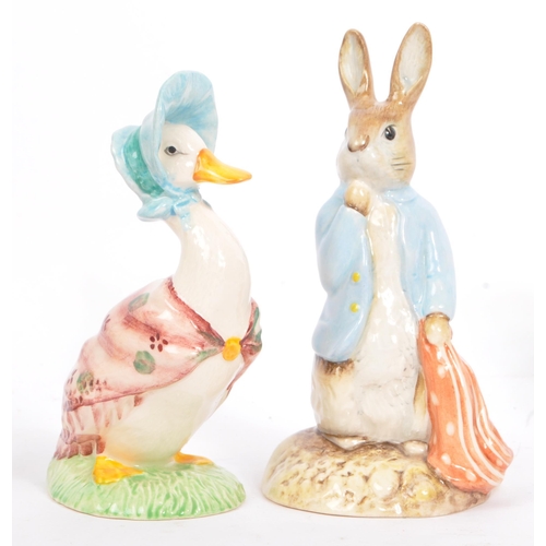 131 - A collection of Royal Albert Beatrix Potter collection and Royal Doulton The Winnie the Pooh collect... 