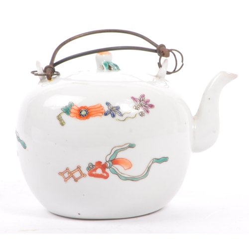 135 - A late 19th century Chinese porcelain teapot. The teapot having white ground with hand painted decor... 