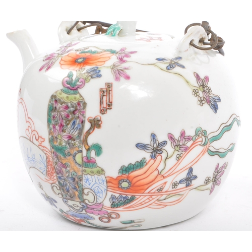 135 - A late 19th century Chinese porcelain teapot. The teapot having white ground with hand painted decor... 