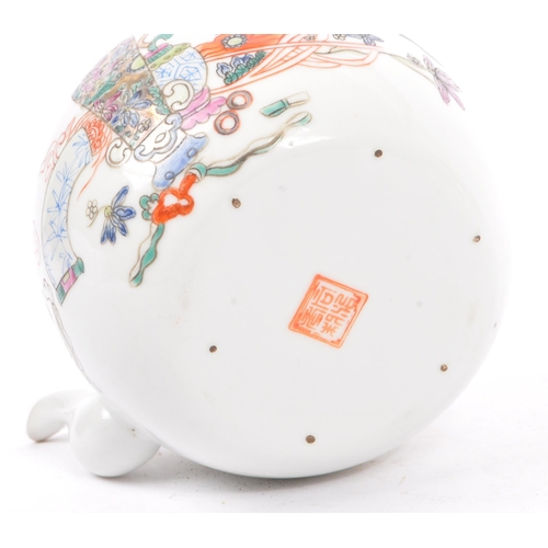 135 - A late 19th century Chinese porcelain teapot. The teapot having white ground with hand painted decor... 