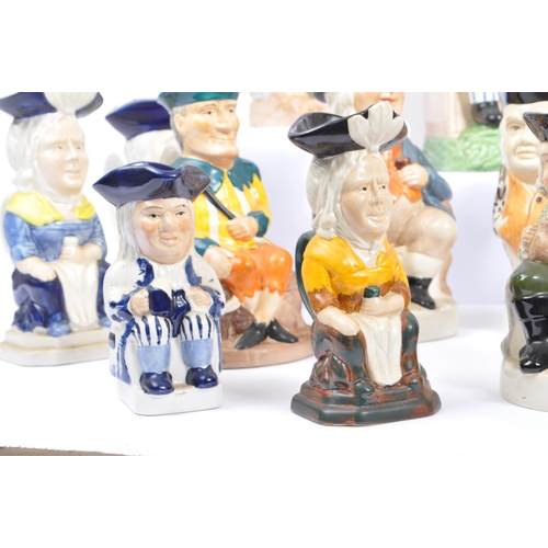 136 - A collection of seventeen 20th Century porcelain ceramic 'Toby & Character' jugs by Wood & Sons. A v... 