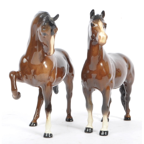 153 - John Beswick Potteries - Two vintage 20th Century glazed porcelain Beswick figures of brown horses, ... 