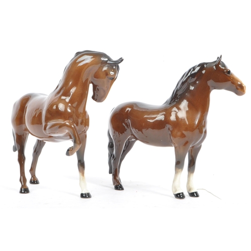 153 - John Beswick Potteries - Two vintage 20th Century glazed porcelain Beswick figures of brown horses, ... 