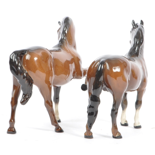 153 - John Beswick Potteries - Two vintage 20th Century glazed porcelain Beswick figures of brown horses, ... 