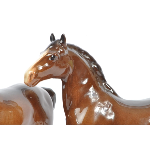 153 - John Beswick Potteries - Two vintage 20th Century glazed porcelain Beswick figures of brown horses, ... 