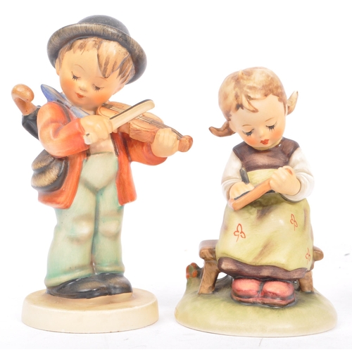 159 - Goebel - A collection of West German Goebel porcelain china figurines. Depicting young children, pla... 