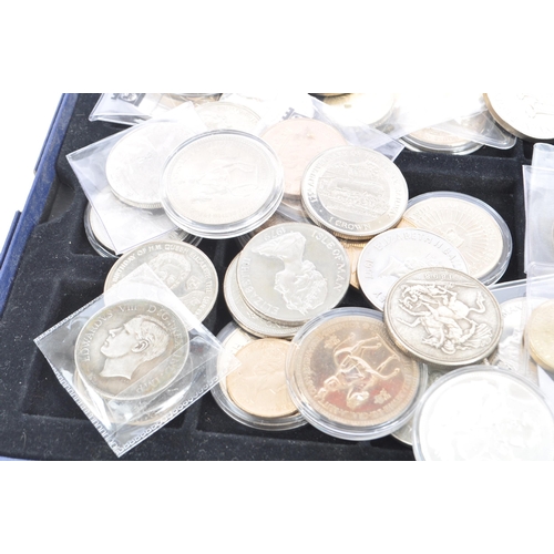 174 - A collection of 20th and 21st century British commemorative coins, to include the overseas territori... 