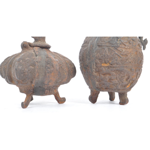 178 - Two early 20th century Indian cast iron inkwells. One of pumpkin form with hinged circular lid and t... 