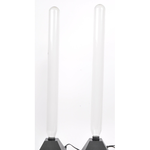 181 - A pair of contemporary desk top induction tube display plasma pillar lightning lamps. Elongated glas... 