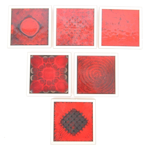 186 - Vetter Kunst Handlung - six 1970's German ceramic tiles, each in a red colourway and having individu... 