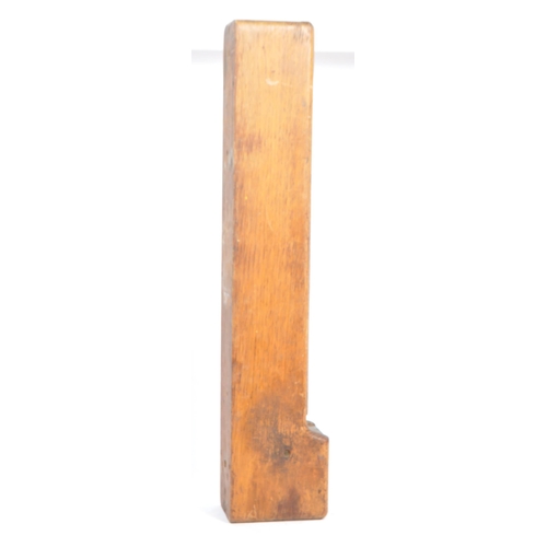 187 - An original early 20th century oak wood wall mounted match dispenser. With internal aluminium casing... 