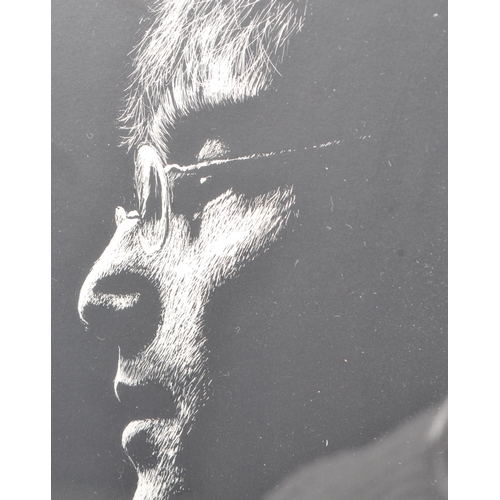 190 - A vintage late 20th century etching of John Lennon (1940 - 1980). Side profile in black and white wi... 