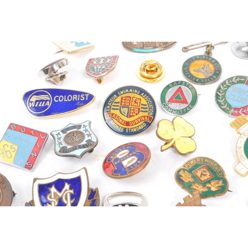 197 - A collection of vintage 20th century enamelled brand / cooperation / group badges. Some examples inc... 