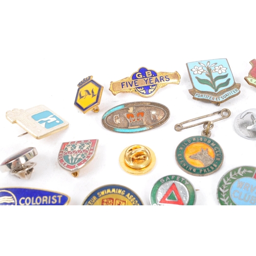 197 - A collection of vintage 20th century enamelled brand / cooperation / group badges. Some examples inc... 