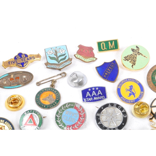 197 - A collection of vintage 20th century enamelled brand / cooperation / group badges. Some examples inc... 