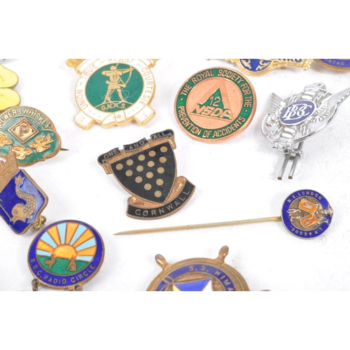 197 - A collection of vintage 20th century enamelled brand / cooperation / group badges. Some examples inc... 