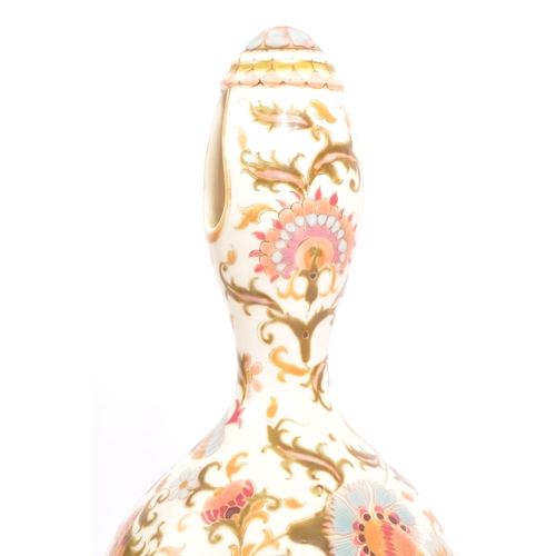 20 - A pair of 20th century Hungarian Zsolnay Pecs vase. Of ceramic construction with circular top, two t... 