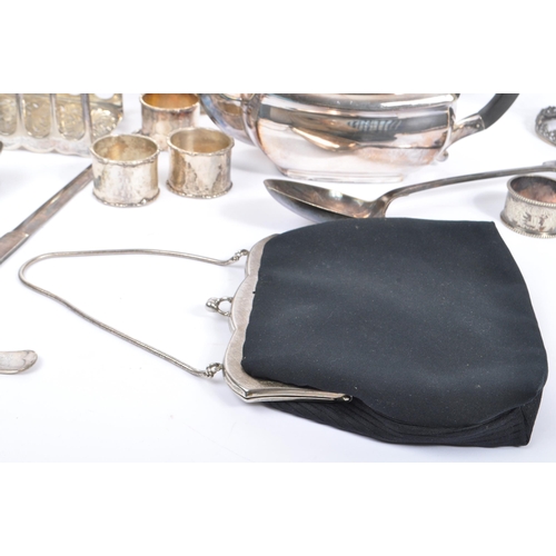 202 - A collection of stamped and marked silver plate tableware and other assorted items. The collection t... 