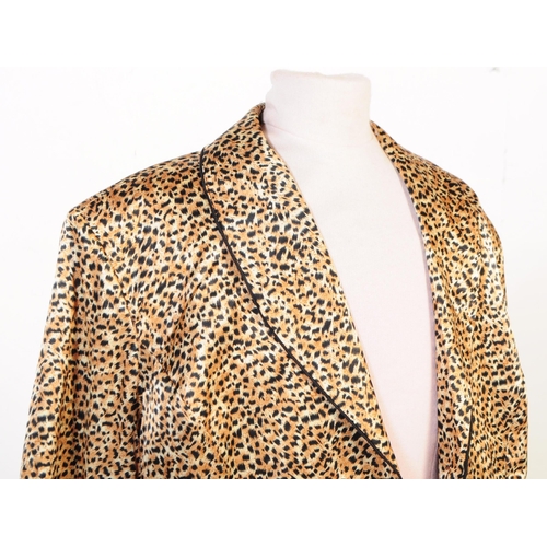 204 - Jaeger - A vintage 20th century silk leopard print Jaeger blazer jacket. The jacket having shoulder ... 