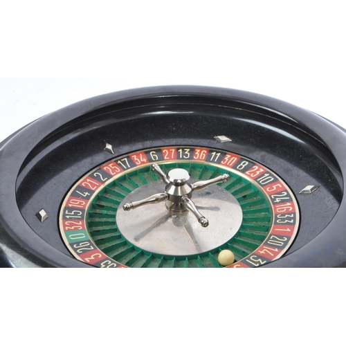 213 - A vintage mid 20th century circa 1950s French Monte-Carlo style table top roulette spinning wheel. T... 